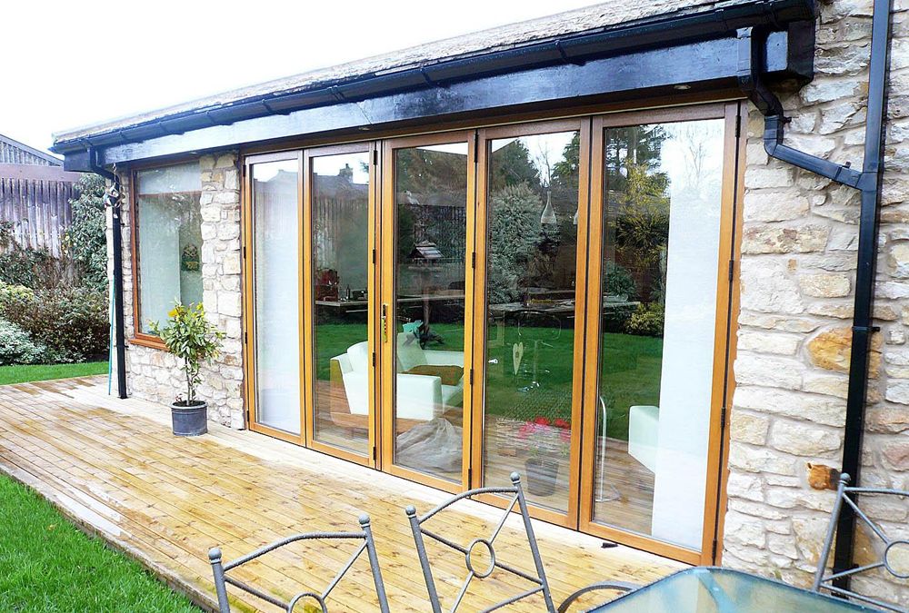 Glass Bi-Fold Doors - Hardwood Timber - Moving Designs Limited - Example 1