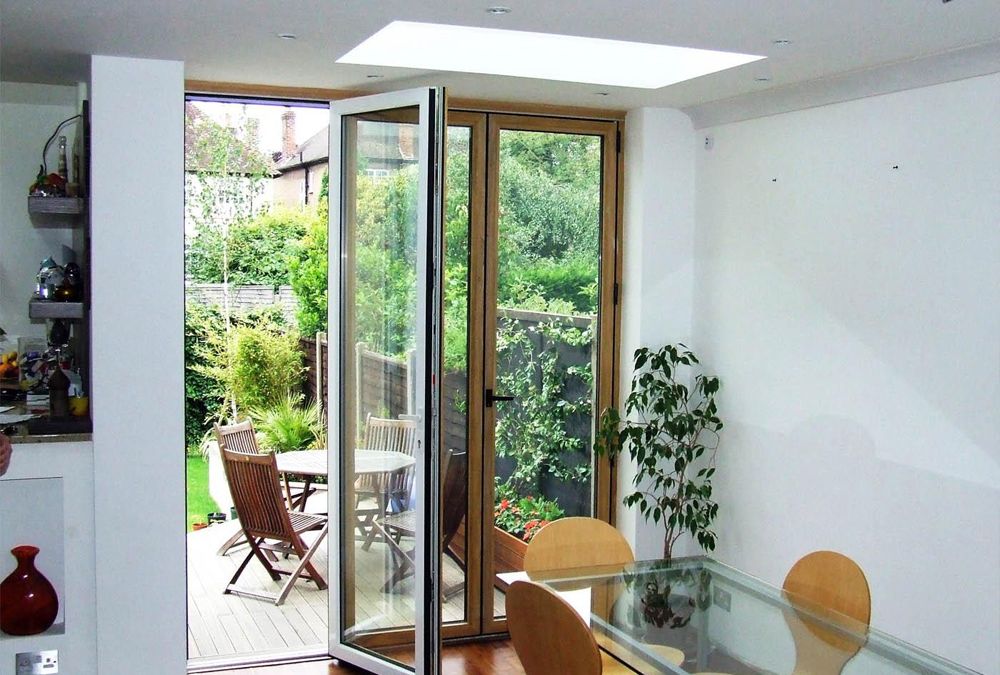 Glass Bi-Fold Doors - Aluminium and Wood - Moving Designs Limited - Example 2